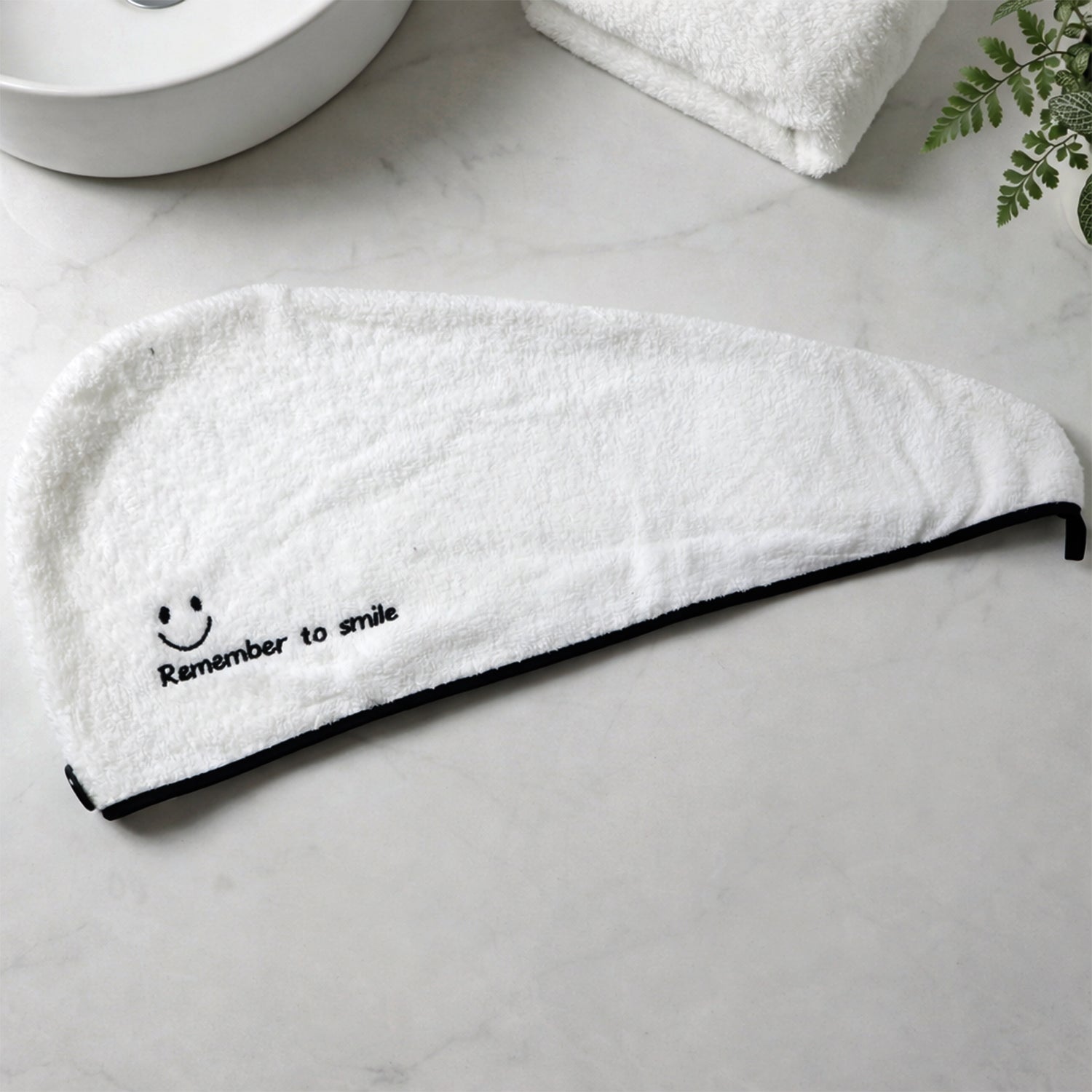 Quick dry hair wrap made of absorbent microfiber material