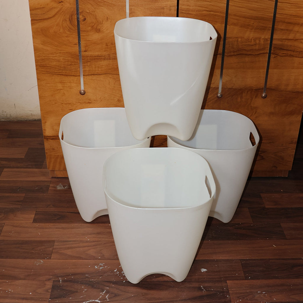 Clean interior of a polypropylene waste paper basket, ideal for dry waste.