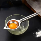 Side view of durable stainless steel egg separating kitchen tool