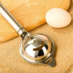 Egg separator tool showing ergonomic handle and separation slots