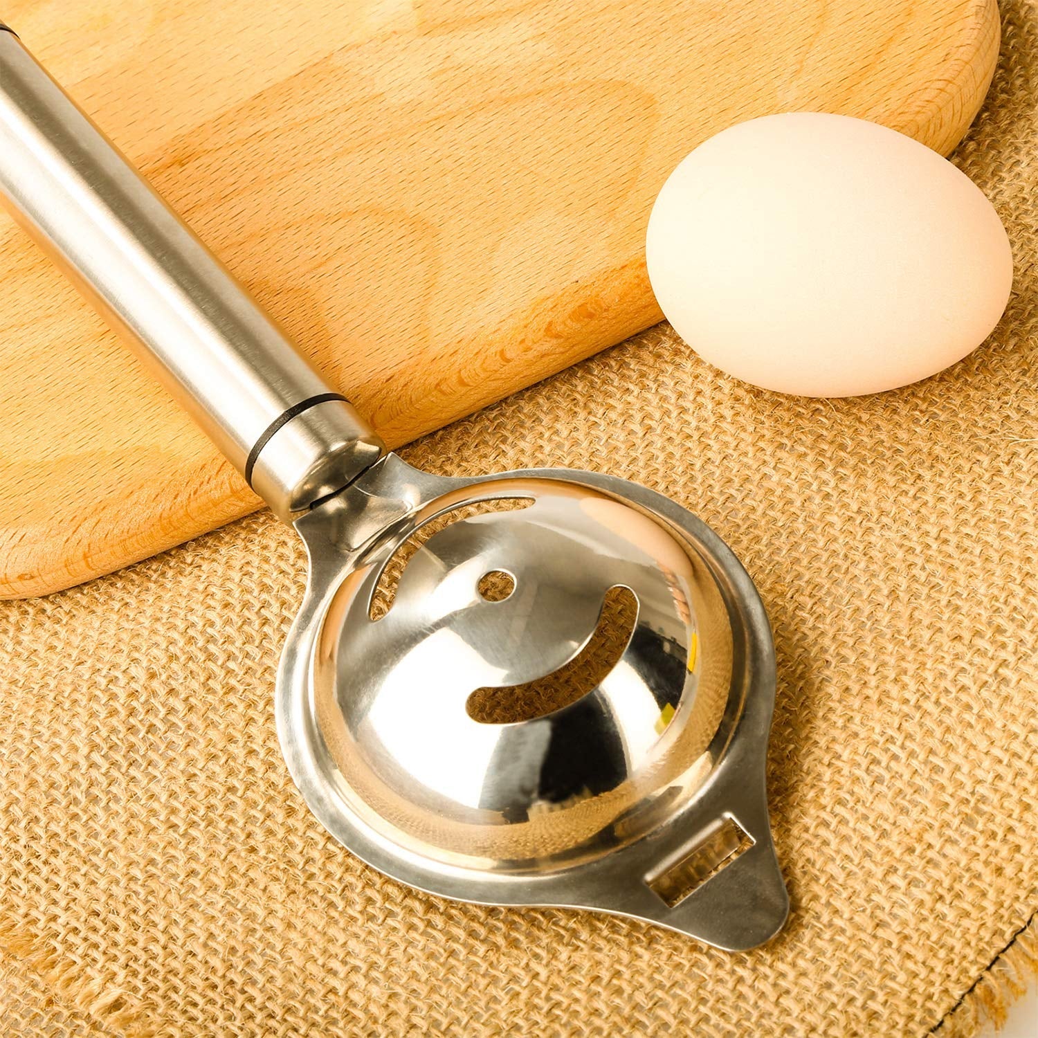 Egg separator tool showing ergonomic handle and separation slots
