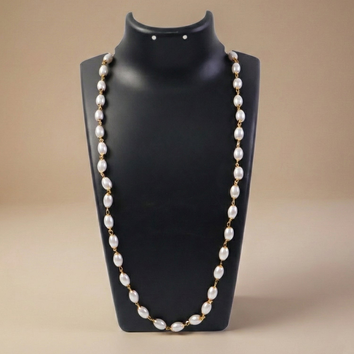 Party wear pearl necklace featuring stylish gold-tone links