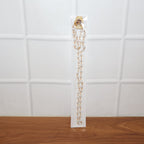 Fashion necklace with pearl beads and gold accent links
