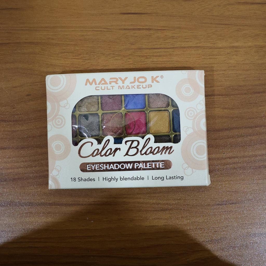 Model showcasing eye makeup created using 18-color shimmer eyeshadow palette