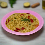 Six vibrant mini soup plates arranged neatly for serving.