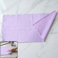 Folded multipurpose microfiber cleaning cloth for versatile use
