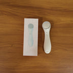 Facial massager device in action on face