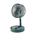 Close-up of compact foldable mini desk fan blades and mesh grille