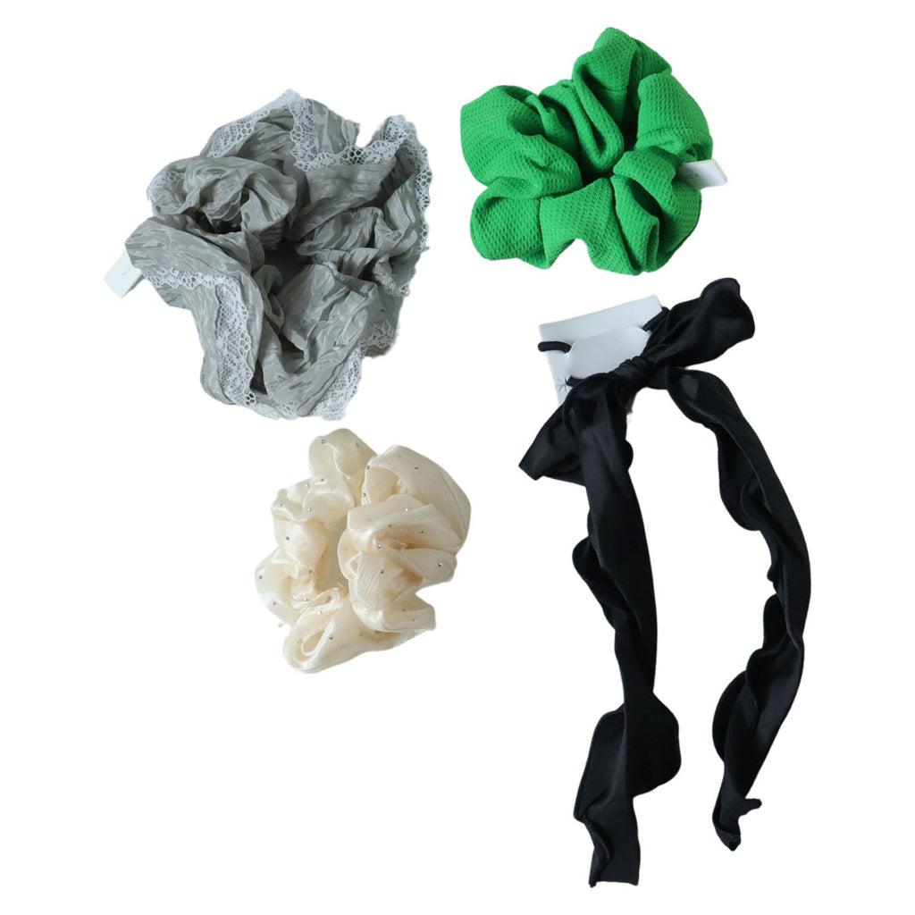 Soft cloth hair scrunchie with cute bow tie accent for elegant wear