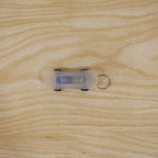 Mini skateboard LED keychain in use