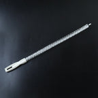 Flexible long brush cleaning a kitchen sink drain