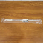 Flexible drain cleaning brush used in kitchen sink for easy clog removal