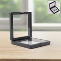 Dual transparent membranes holding rings in jewellery display box
