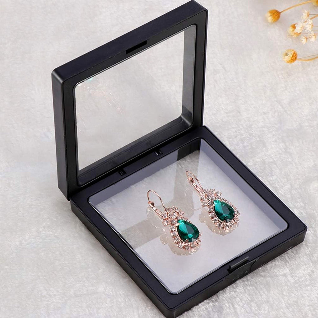 Floating jewellery display frame organizer holding earrings