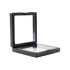 Transparent jewellery display box placed on a table
