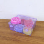 Rose shaped wax candles adding warm light to home décor and special occasions