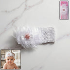 Baby wearing a soft elastic floral headband, showcasing style and comfort for infants