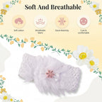 Styling example of floral baby headband, worn by a toddler outdoors