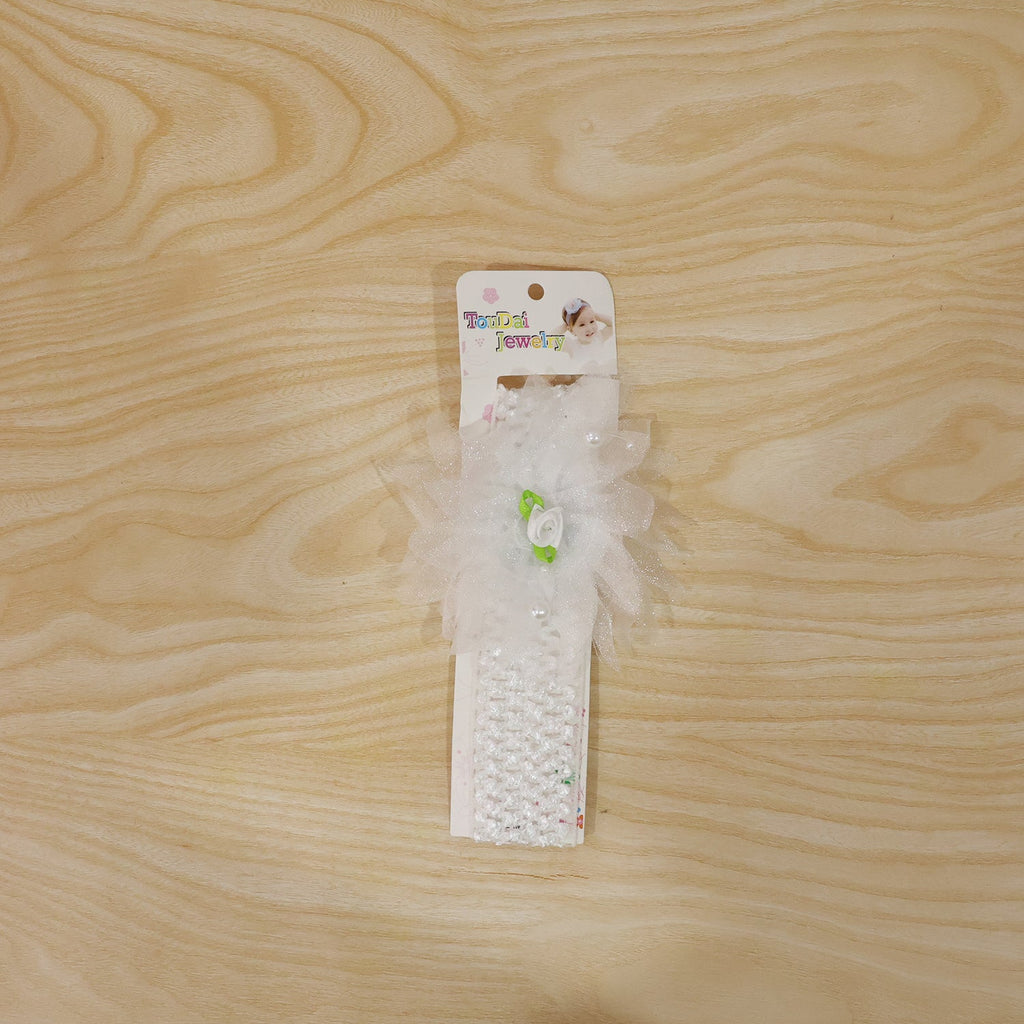Baby headband with floral bow, perfect for parties and casual outings