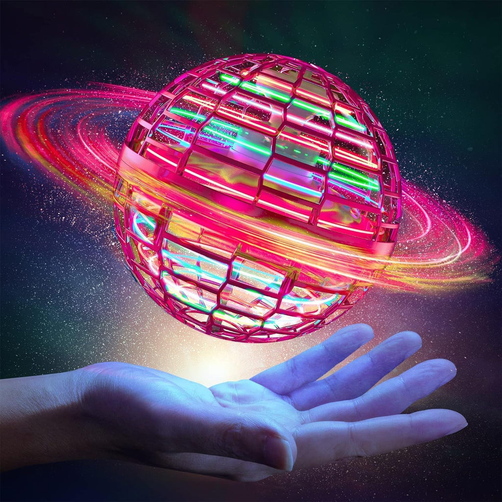 Comparison shot of the flying ball toy next to a hand to illustrate its scale.