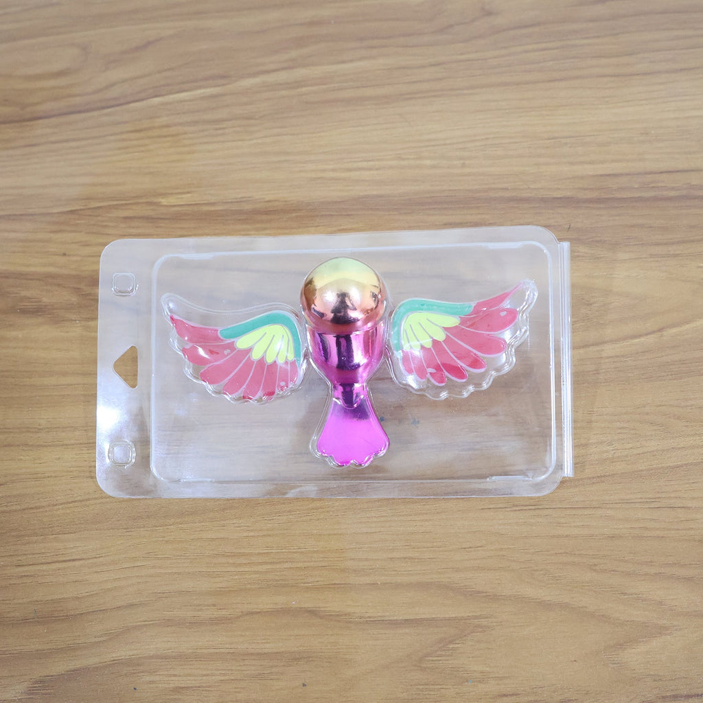 Dashboard bird figurine with wings fluttering through wind activation