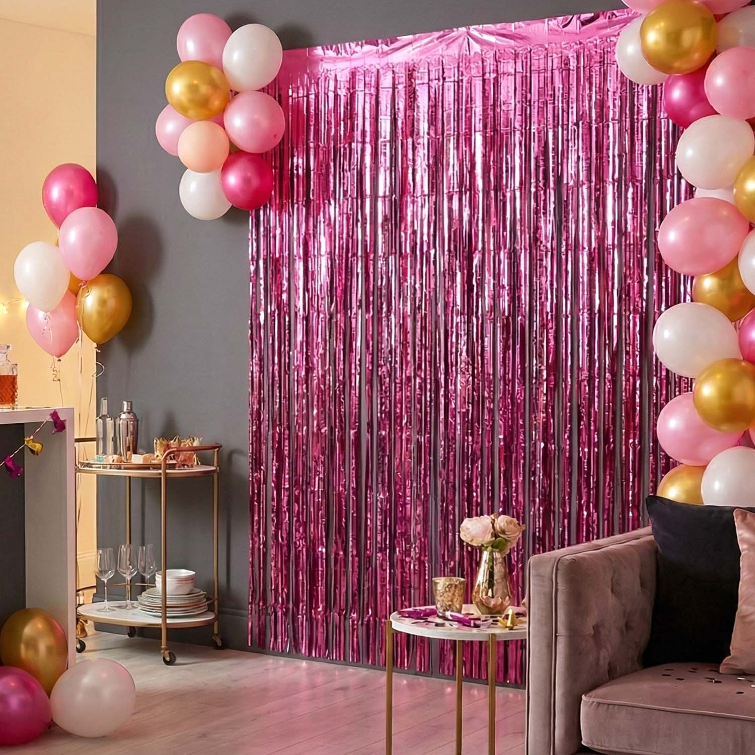 Foil fringe curtain enhancing festive atmosphere at a home party.