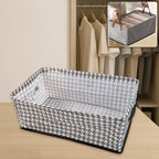 A foldable canvas storage basket, 42x28cm, shown open and ready for use in a clean home setting.