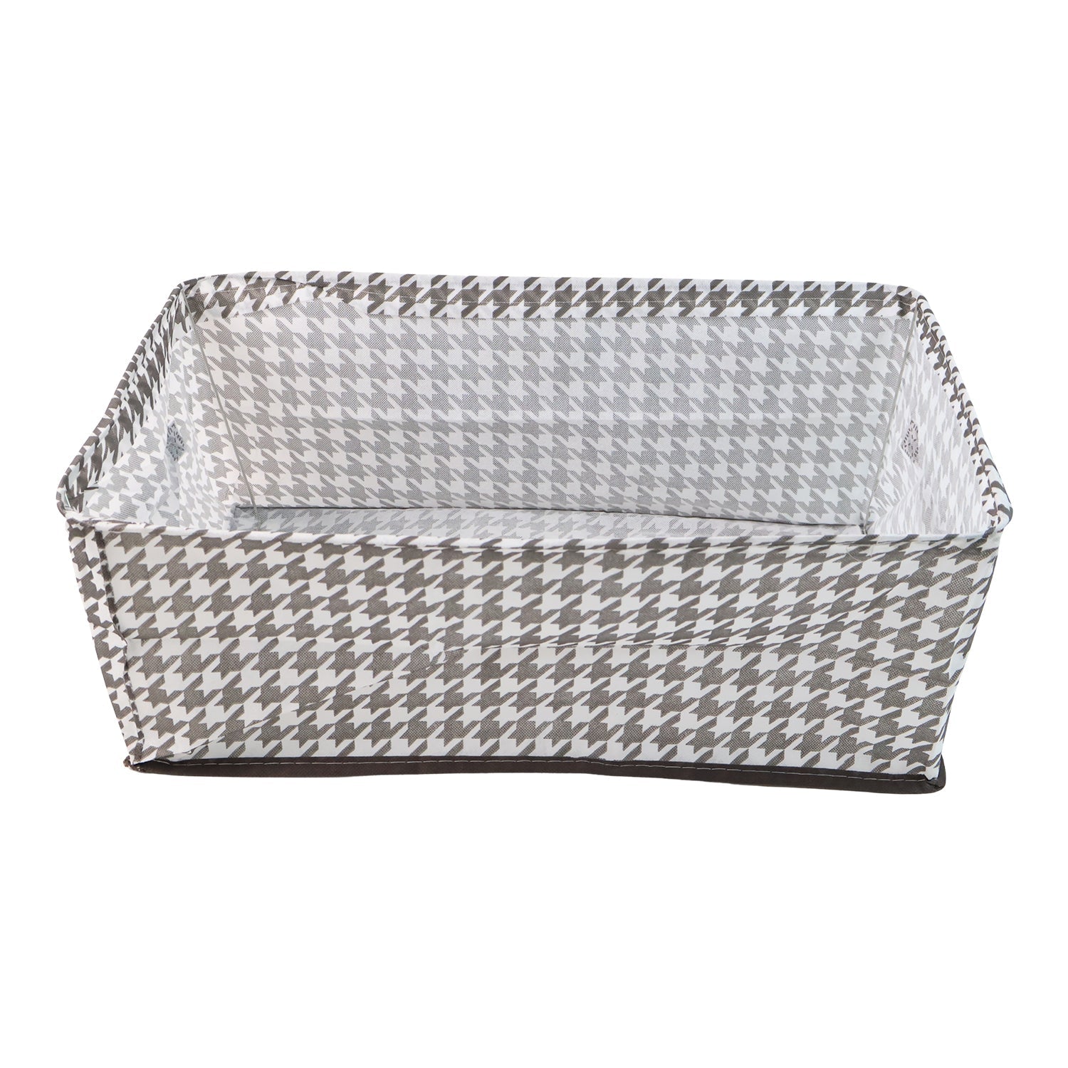 A minimalist-designed foldable canvas storage basket filled with soft linens, enhancing room aesthetics.