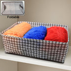 Close-up of the integrated handles on the foldable canvas storage basket, designed for comfortable carrying.