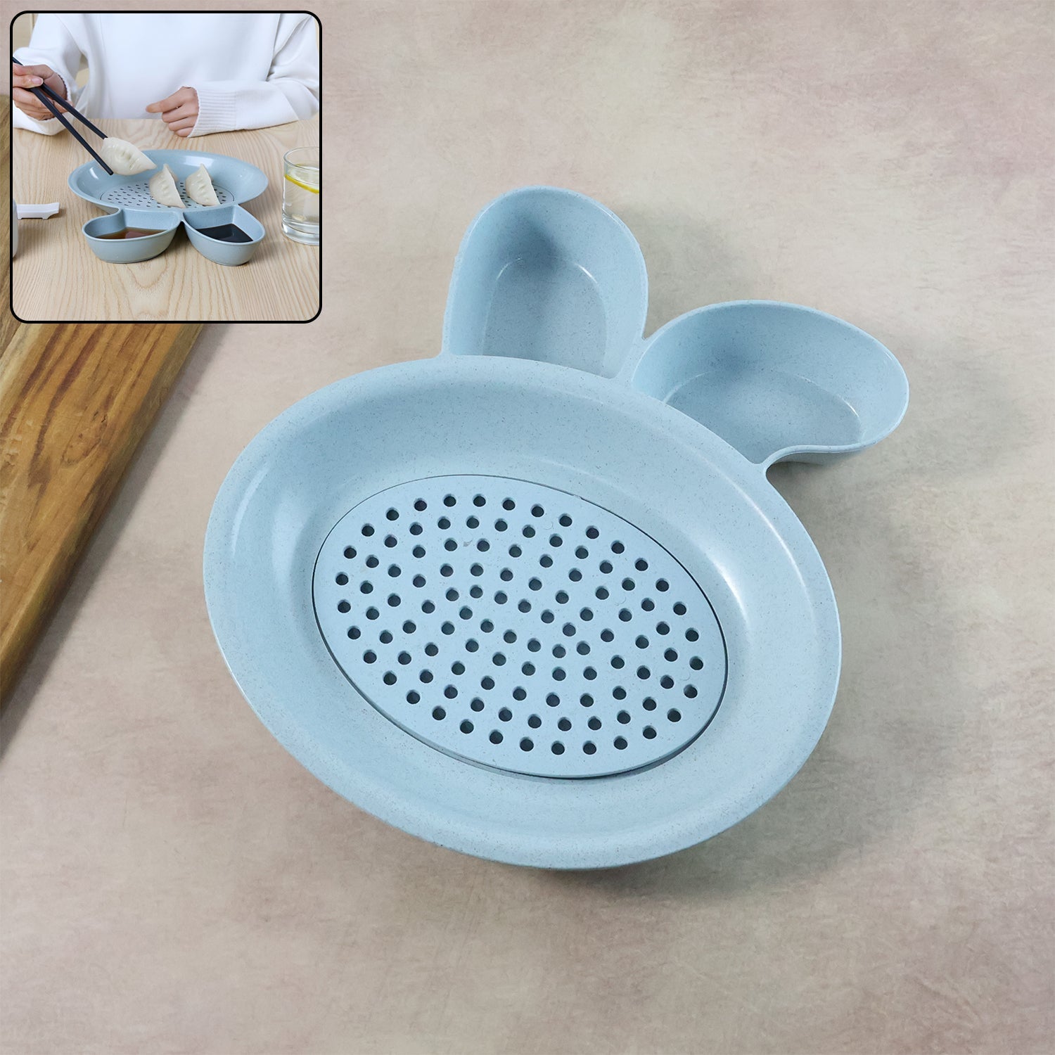 Dumpling serving plate with built-in perforated strainer for draining excess oil