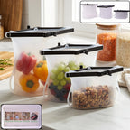 Set of three colorful reusable silicone food bags with zip seals.