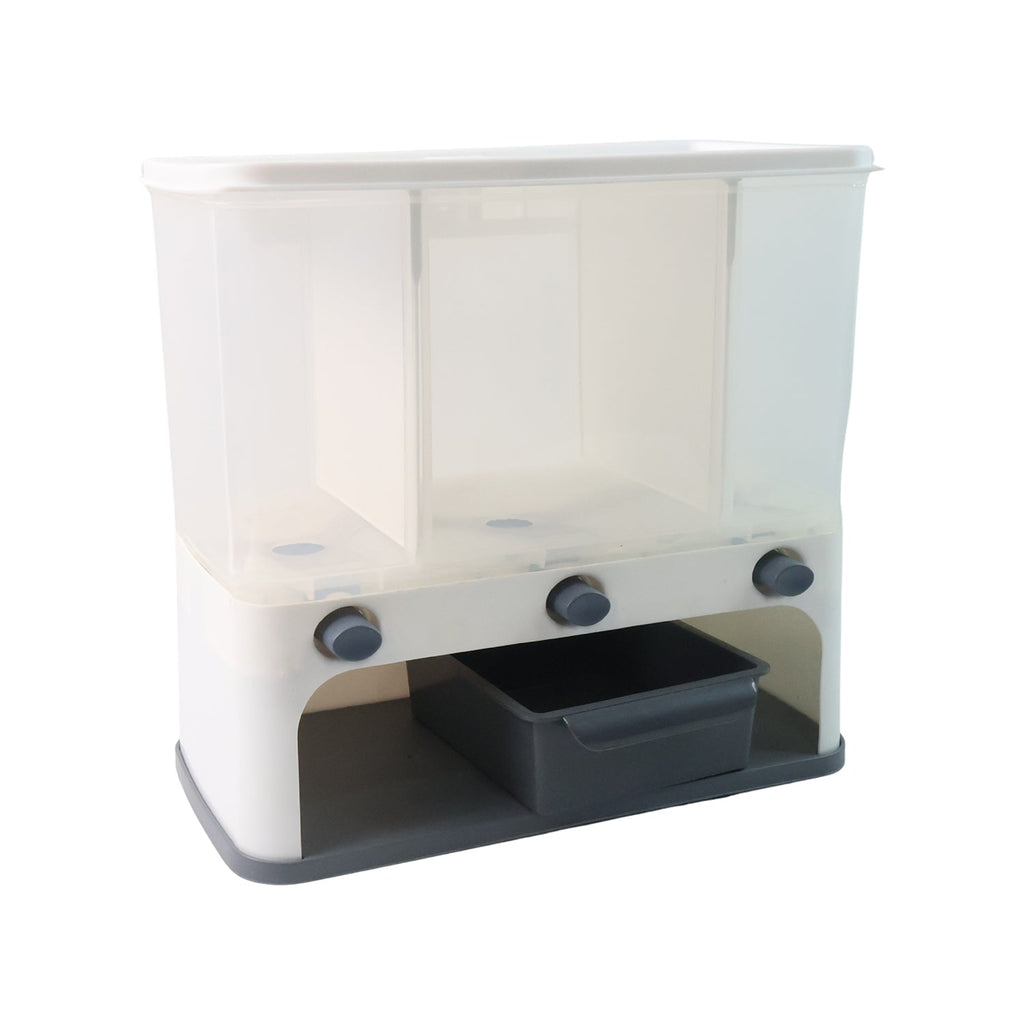 User dispensing rice from the multi-compartment wall mount food dispenser into a bowl.