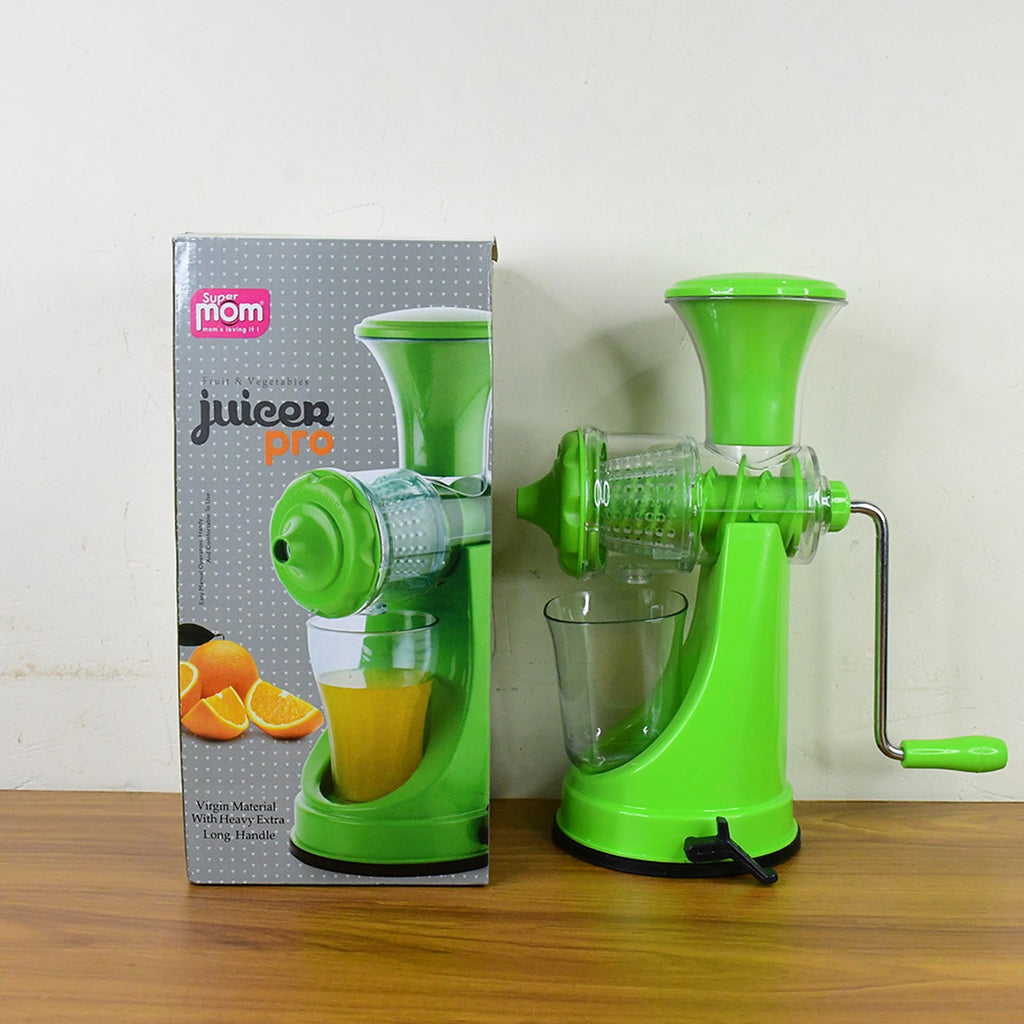 Compact manual cold press juicer setup for home kitchen use