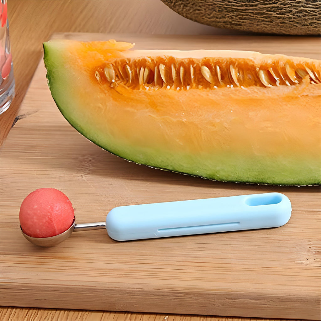 Close-up of fruit cutter with stainless steel scoop for precise cutting
