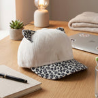 Cap with cat ears on white background, cozy winter headwear