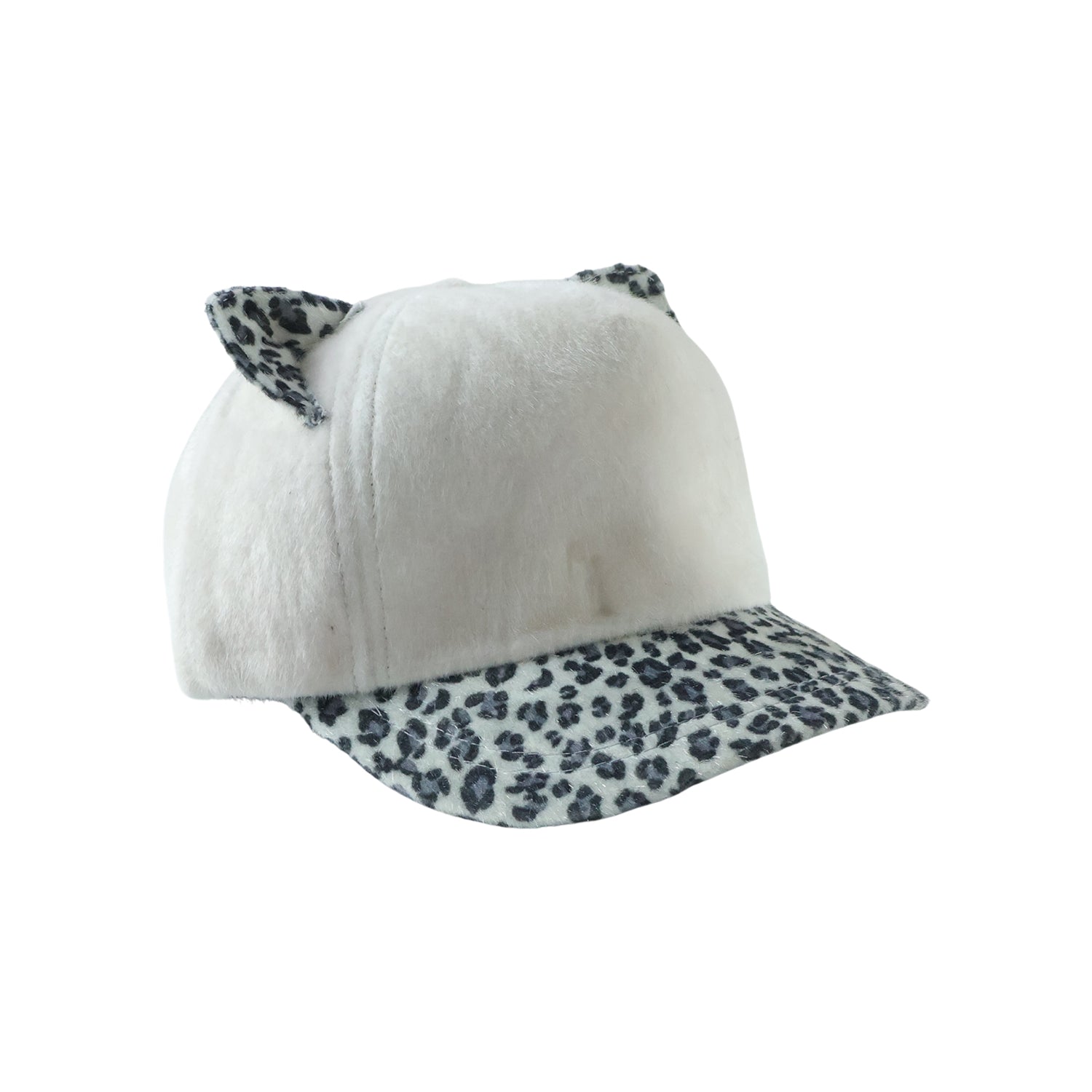 Winter fur cap styled on mannequin, playful winter accessory