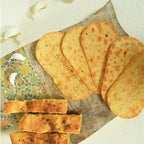 Close-up of Maniarr's Garlic Bread Khakhra, highlighting its crispy texture.