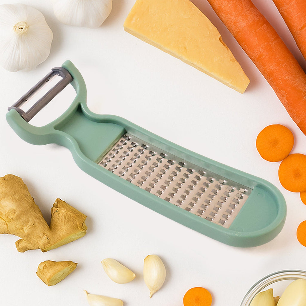 Ergonomic vegetable grater and peeler combo for shredding carrots and cucumbers