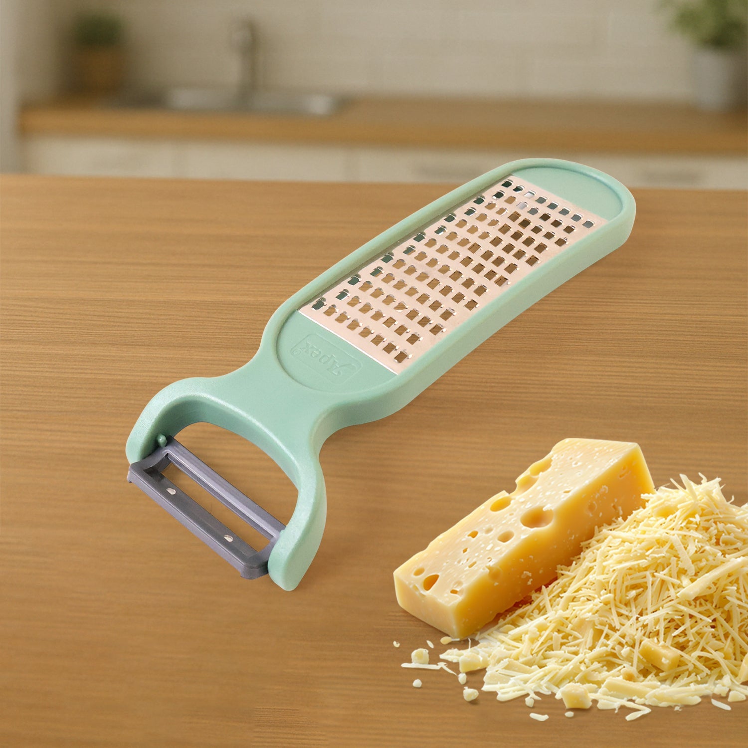 Multipurpose kitchen tool combining grater and peeler with easy grip