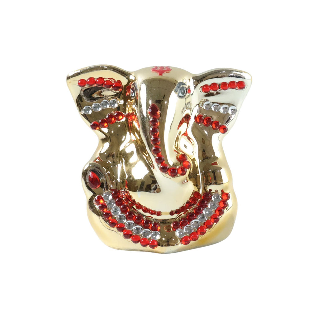 Gold finish Ganesha idol enhancing spiritual and traditional décor