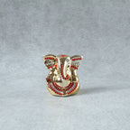 Religious decorative idol featuring golden finish for home and car