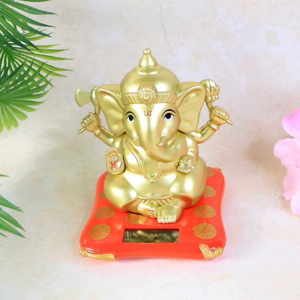 Large Lord Ganesha idol seated on a decorative solar-powered base