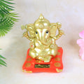 Large Lord Ganesha idol seated on a decorative solar-powered base