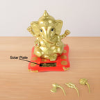 Decorative religious idol of Lord Ganesha with vibrant red base