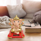 Video demonstrating movement of Solar-Powered Dancing Ganesha Idol activating from light