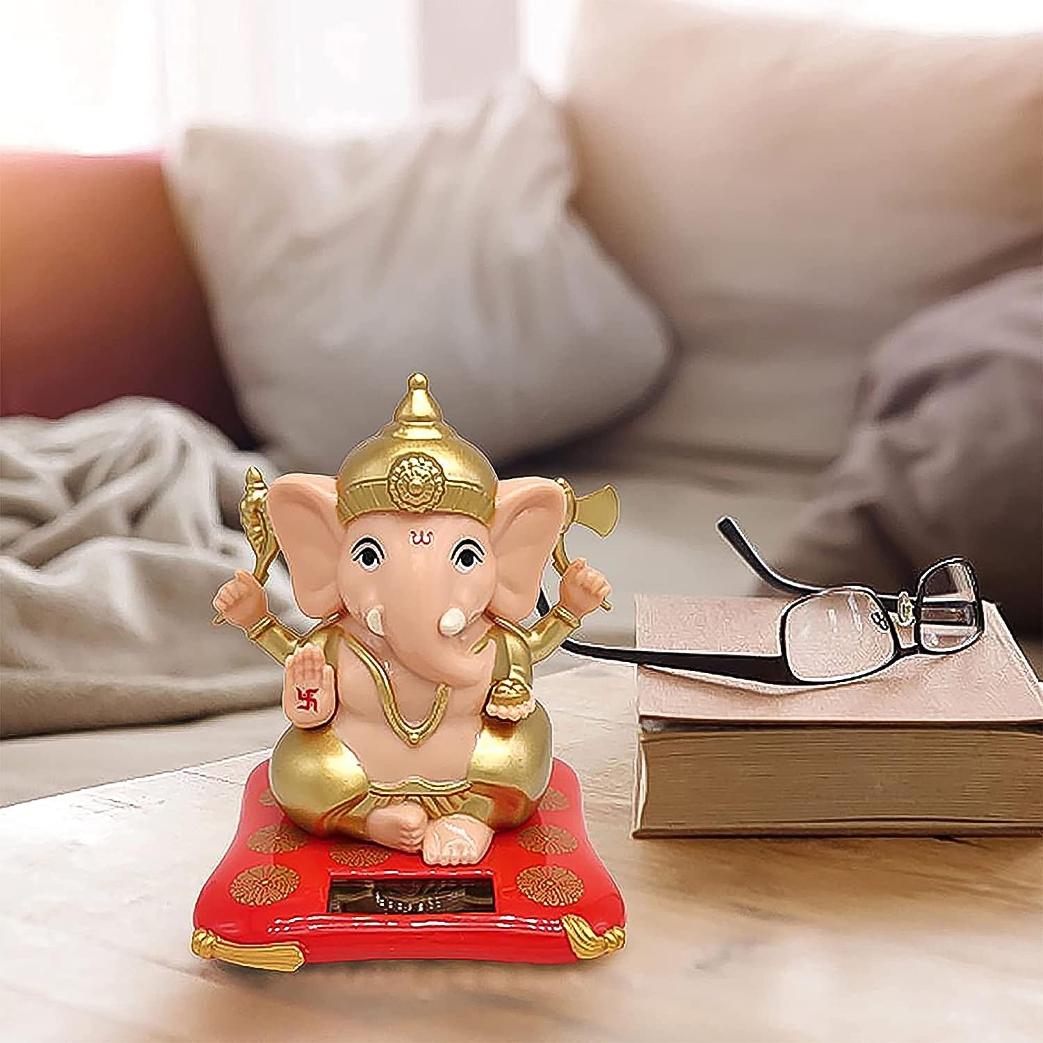 Video demonstrating movement of Solar-Powered Dancing Ganesha Idol activating from light