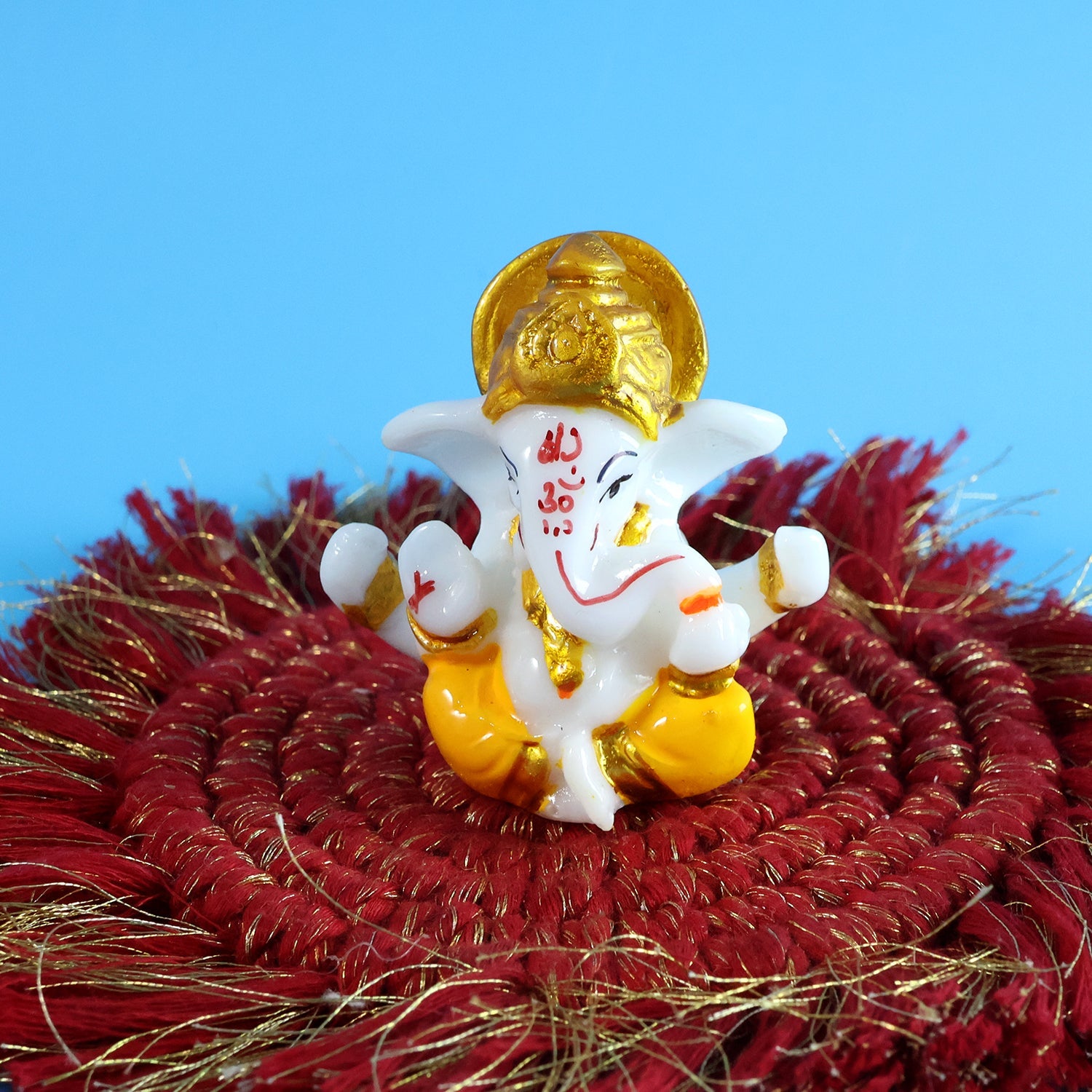 Lord Ganesha idol for home temple with golden ornamental crown