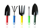 The essential gardening hand tools set neatly arranged, ready for various garden maintenance tasks.