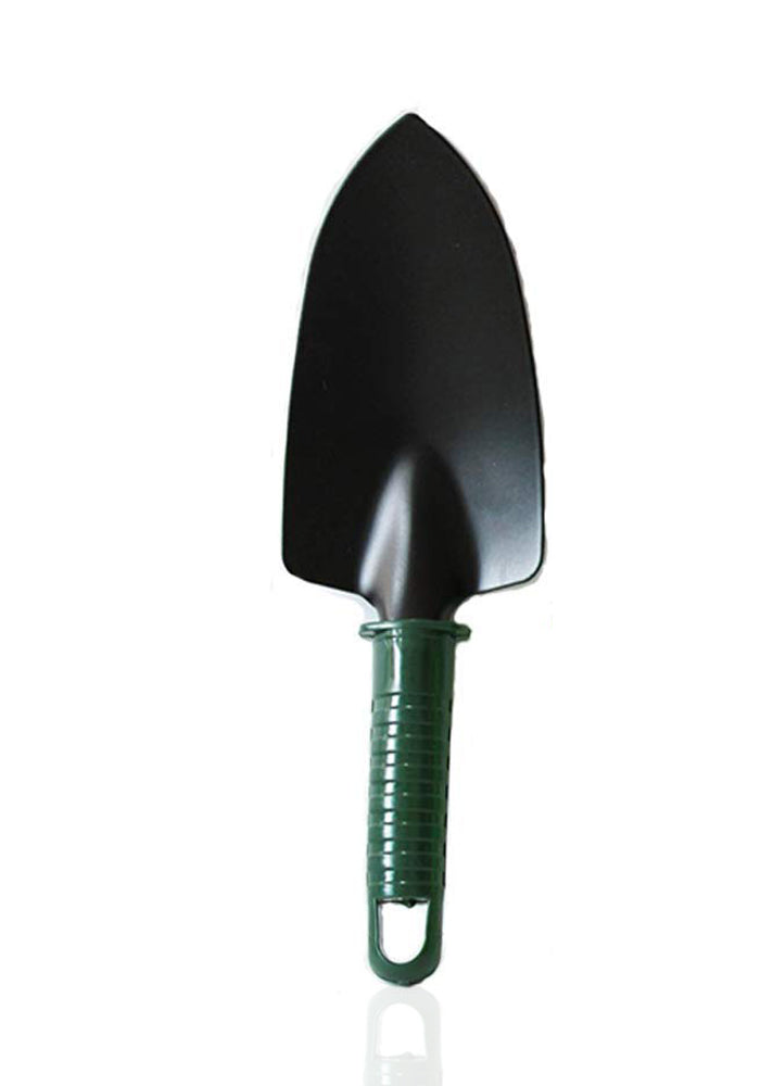 Various hand tools from the gardening set, including a cultivator and fork, ready for use.