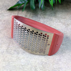 Backside view of Supermom garlic press crusher